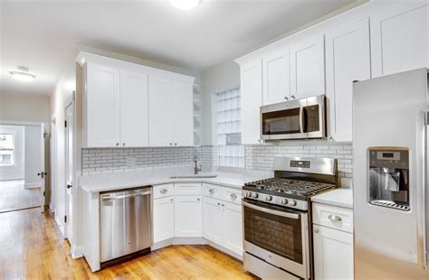 stainless steel dishwasher or white with white cabinets|mix white stainless steel appliances.